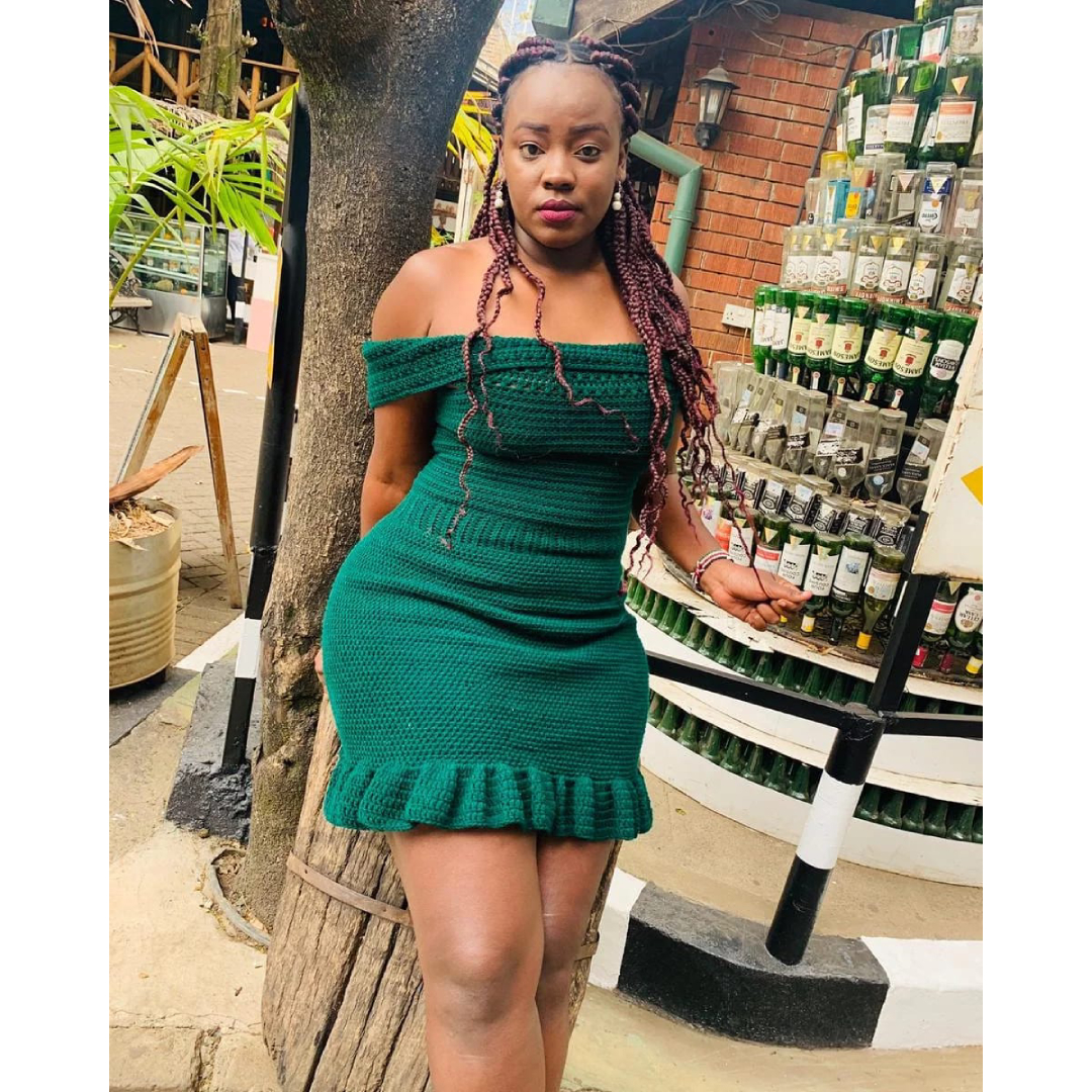 Green ruffled off shoulder mini dress